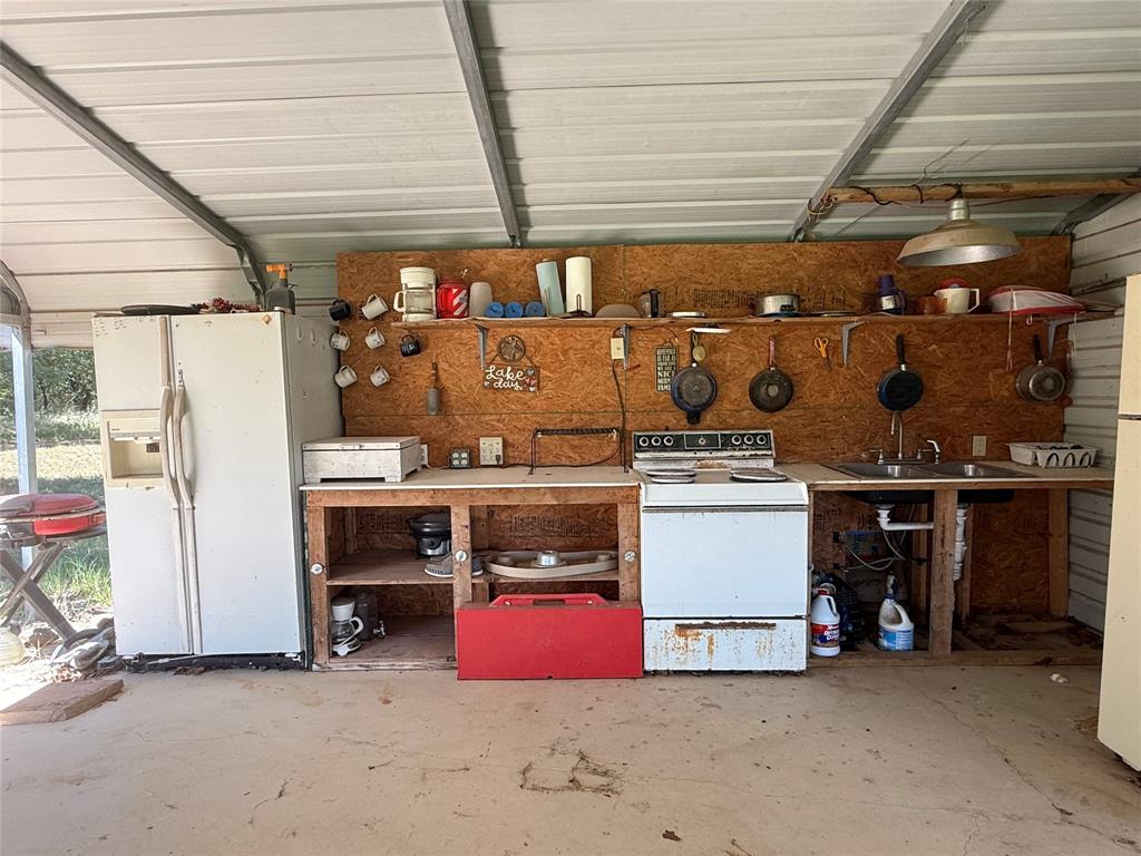 23 Promontory Port Comanche, TX 76442 - Photo 19 of 23 a view of storage and utility room