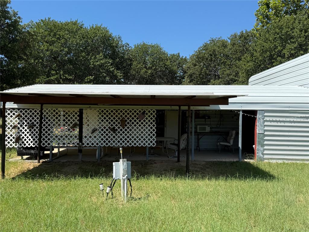23 Promontory Port Comanche, TX 76442 - Photo 23 of 23 a view of a house with a backyard