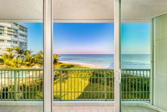 a bathroom with a granite countertop sink mirror and bathtub