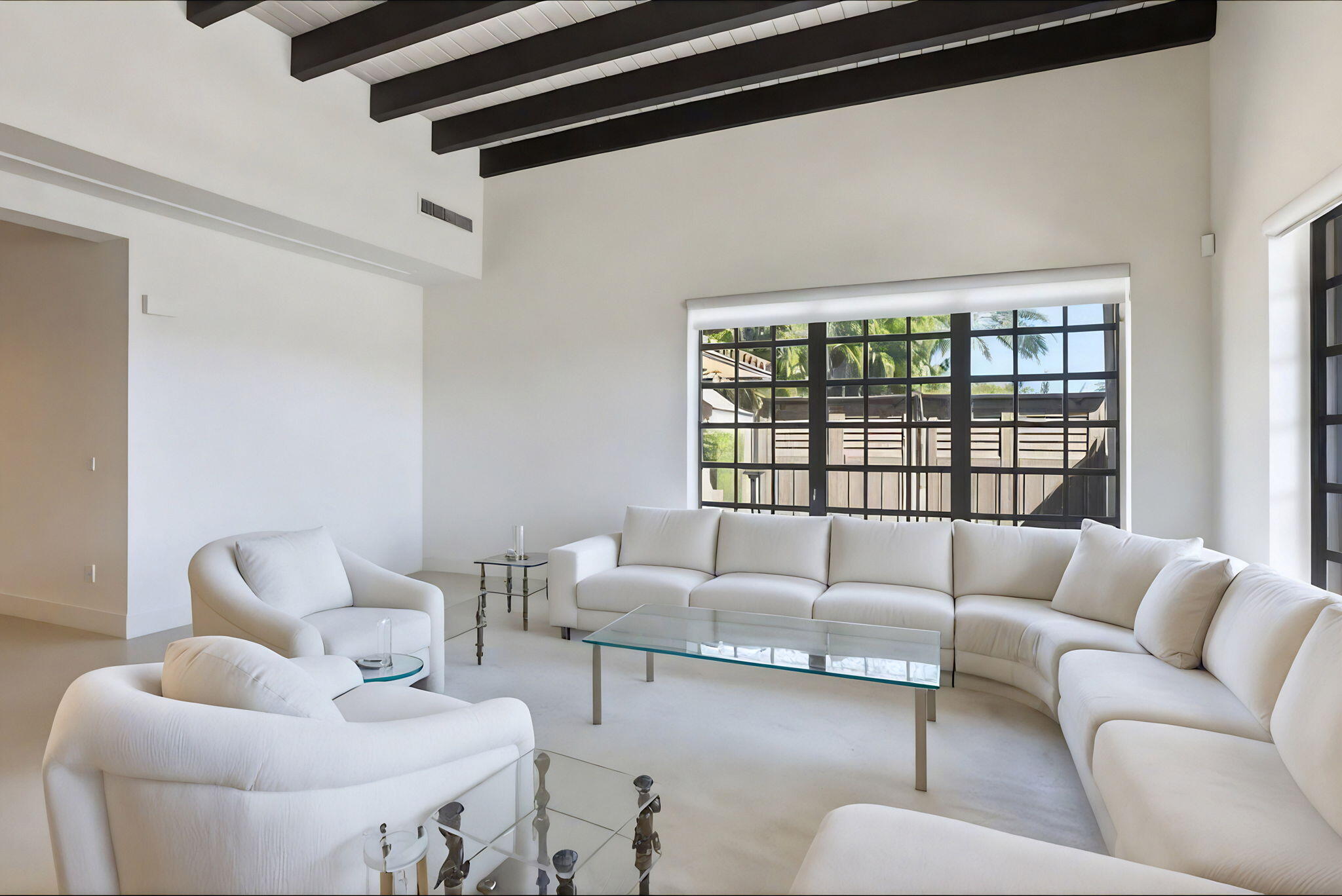 2850 Northeast 44th Street Lighthouse Point, FL 33064 - Photo 19 of 67 a living room with furniture and a large window