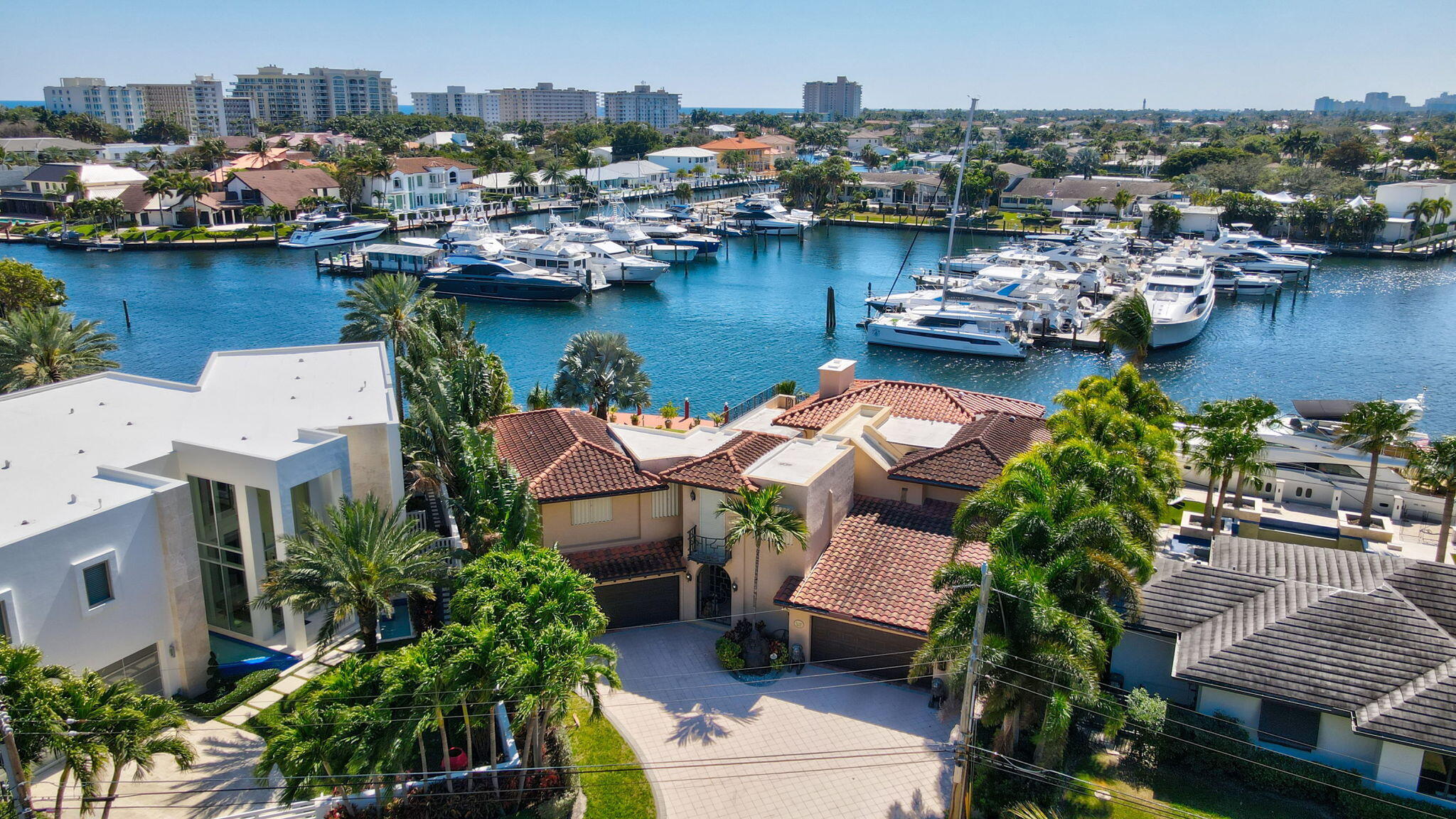 2850 Northeast 44th Street Lighthouse Point, FL 33064 - Photo 2 of 67 a view of a lake with outdoor seating space and water view
