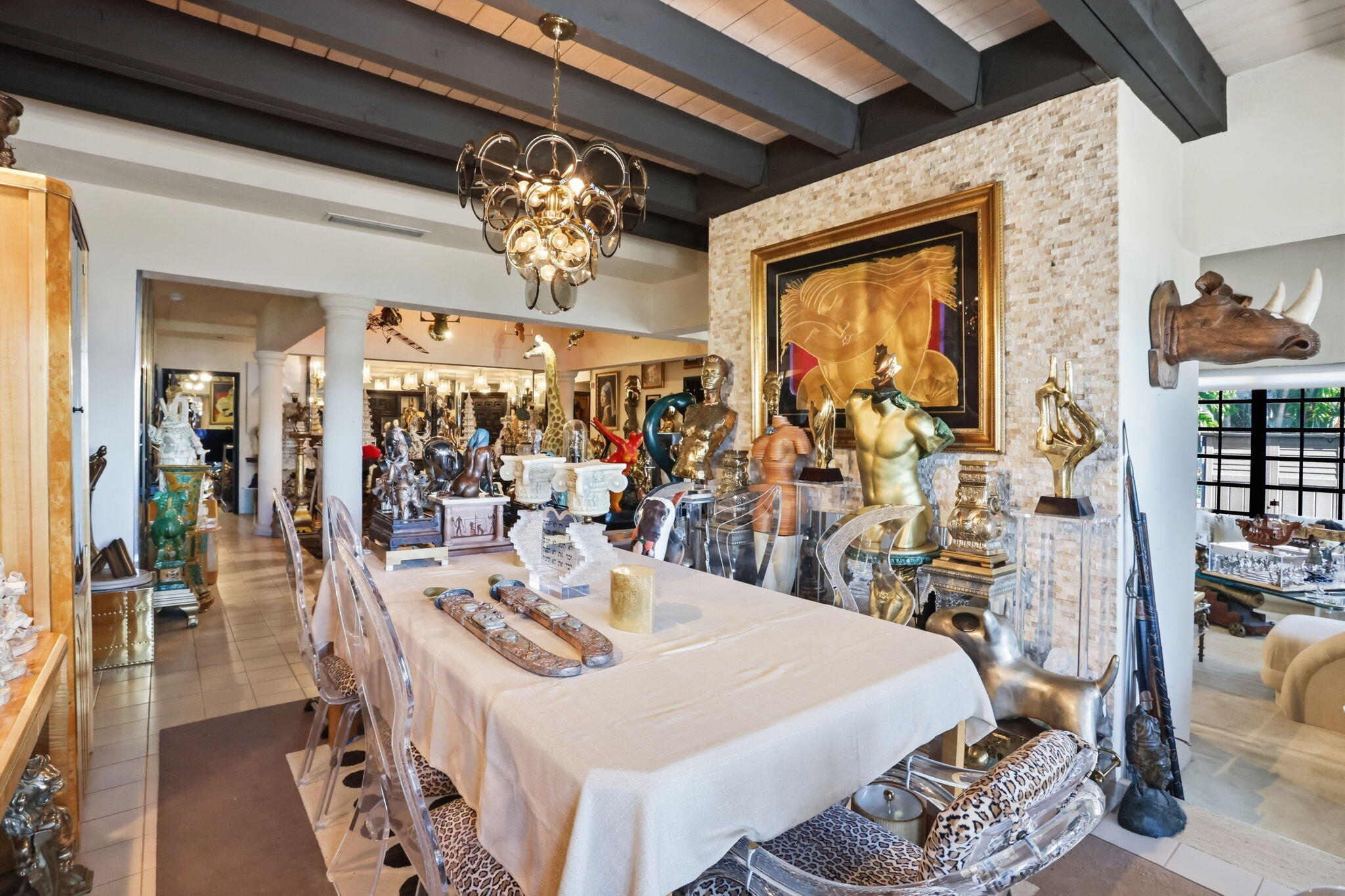 2850 Northeast 44th Street Lighthouse Point, FL 33064 - Photo 22 of 67 a view of a dining room with furniture and chandelier
