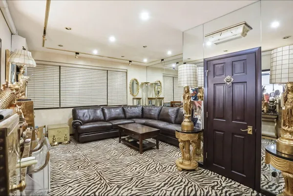 a view of a city with lots of residential buildings ocean and ocean view