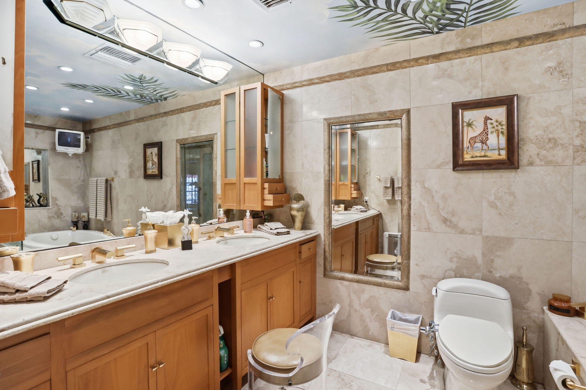 2850 Northeast 44th Street Lighthouse Point, FL 33064 - Photo 44 of 67 a bathroom with a toilet sink a mirror and vanity