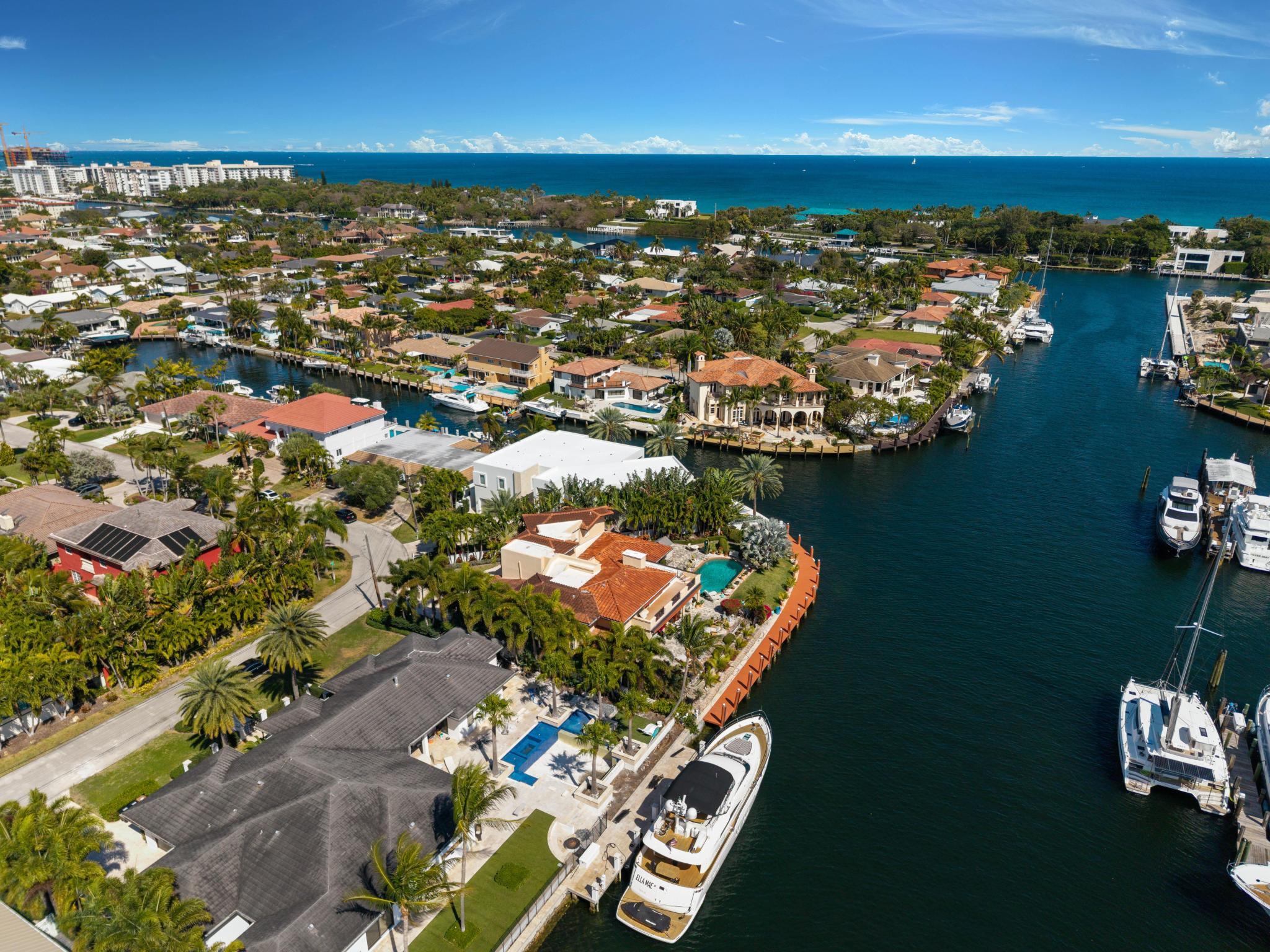 2850 Northeast 44th Street Lighthouse Point, FL 33064 - Photo 8 of 67 an aerial view of residential houses with outdoor space and lake view