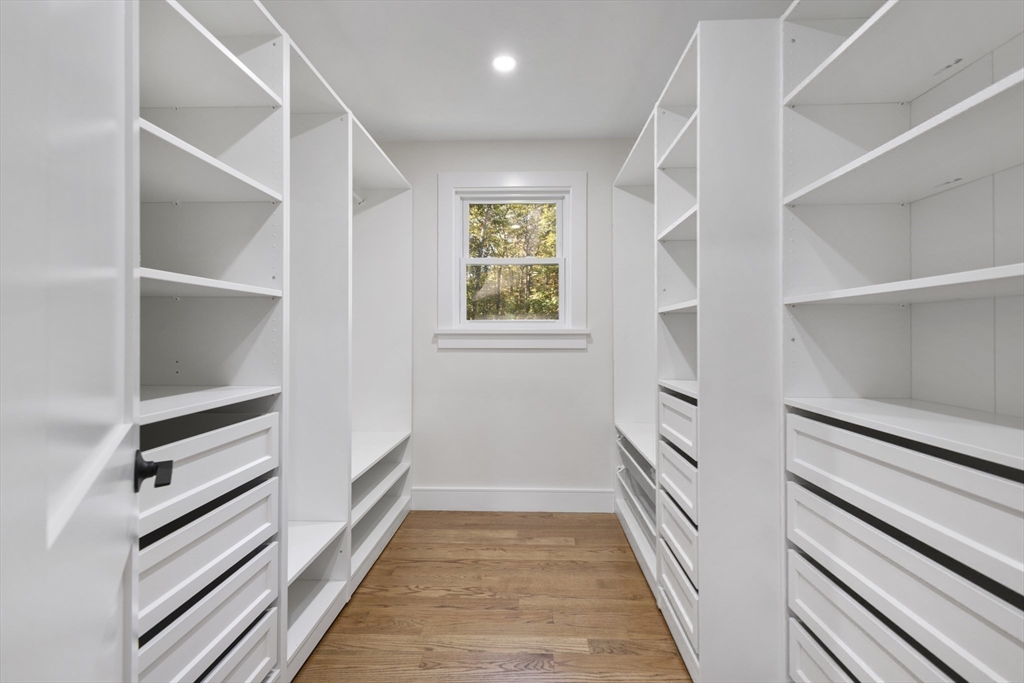 241 Prospect Street Franklin, MA 02038 - Photo 25 of 42 a view of hallway with stairs and wooden floor