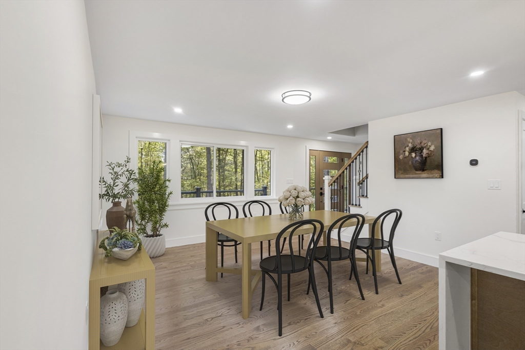 241 Prospect Street Franklin, MA 02038 - Photo 9 of 42 a view of a a dining room with furniture window and wooden floor