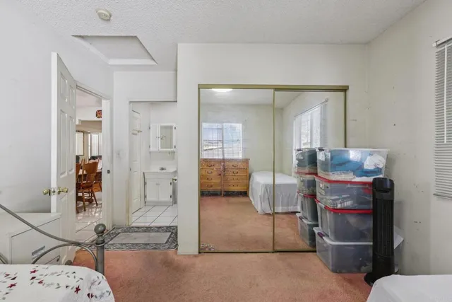 a bedroom with furniture and a couch