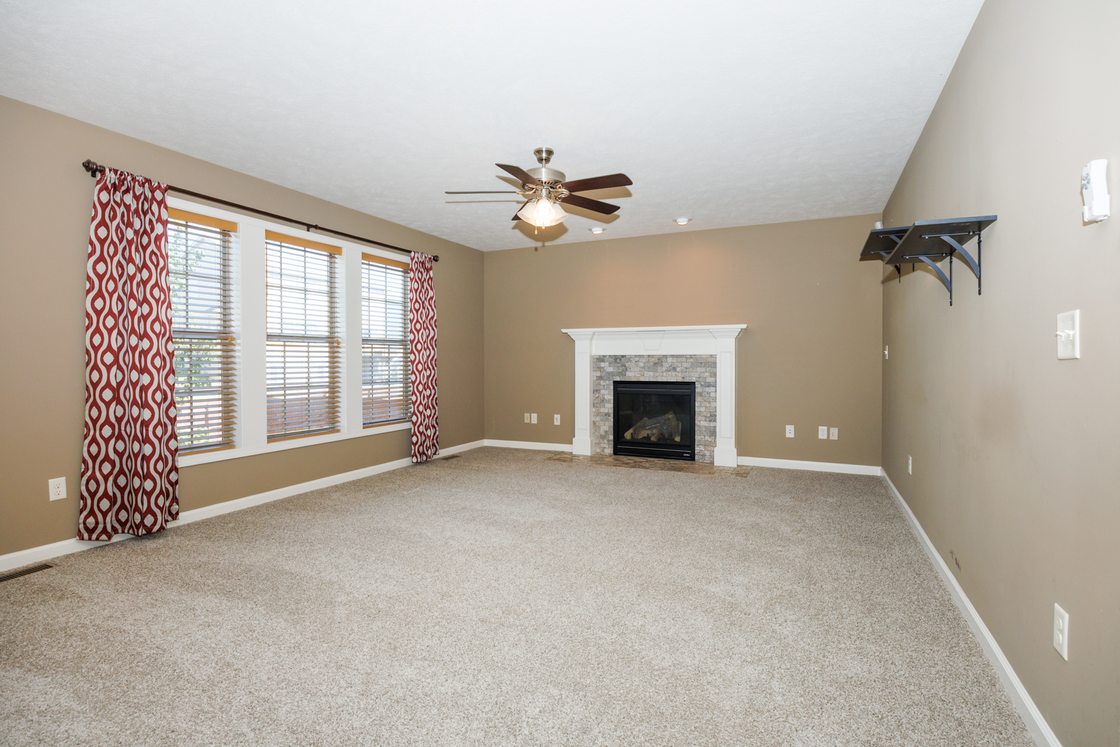 1714 Flagstone Drive Normal, IL 61761 - Photo 15 of 61 an empty room with windows and fan