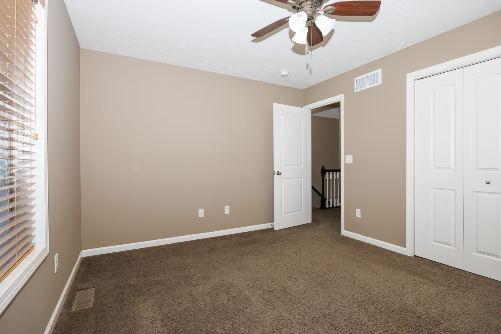 1714 Flagstone Drive Normal, IL 61761 - Photo 30 of 61 a view of an empty room with a window