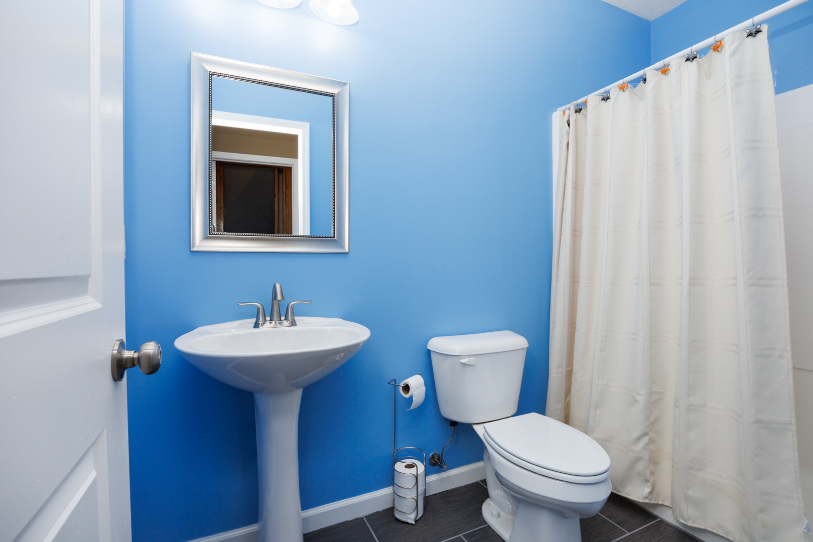 1714 Flagstone Drive Normal, IL 61761 - Photo 48 of 61 a bathroom with a toilet sink and mirror