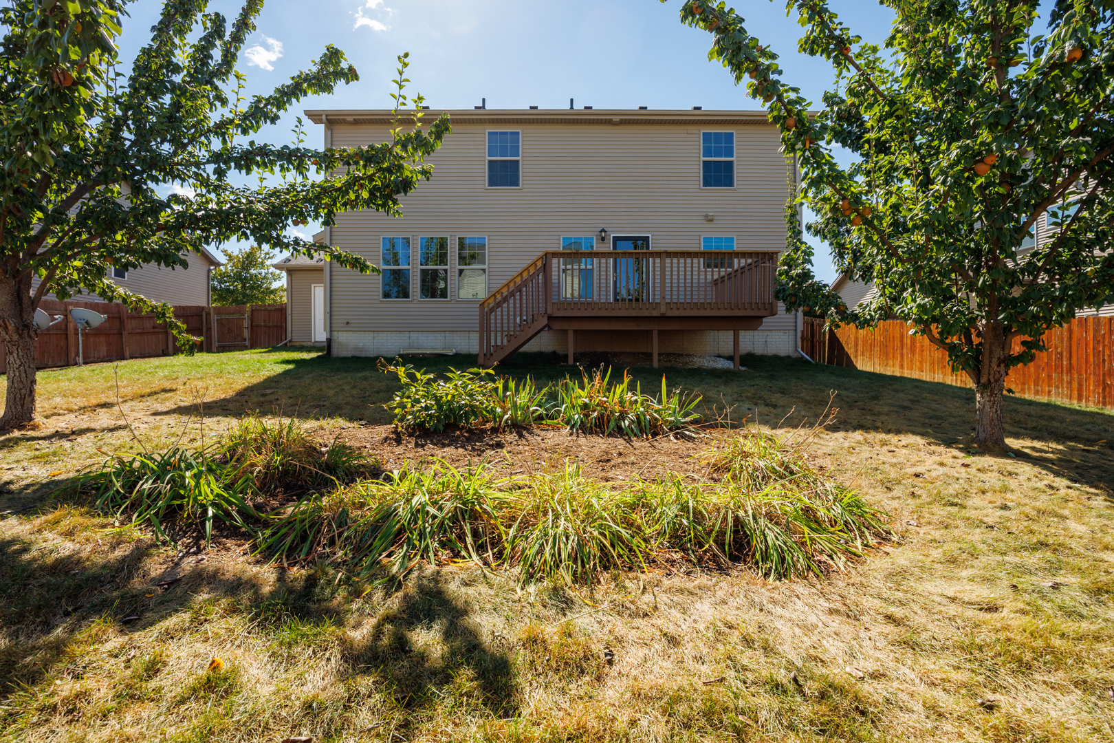 1714 Flagstone Drive Normal, IL 61761 - Photo 56 of 61 a backyard of a house with yard and outdoor seating