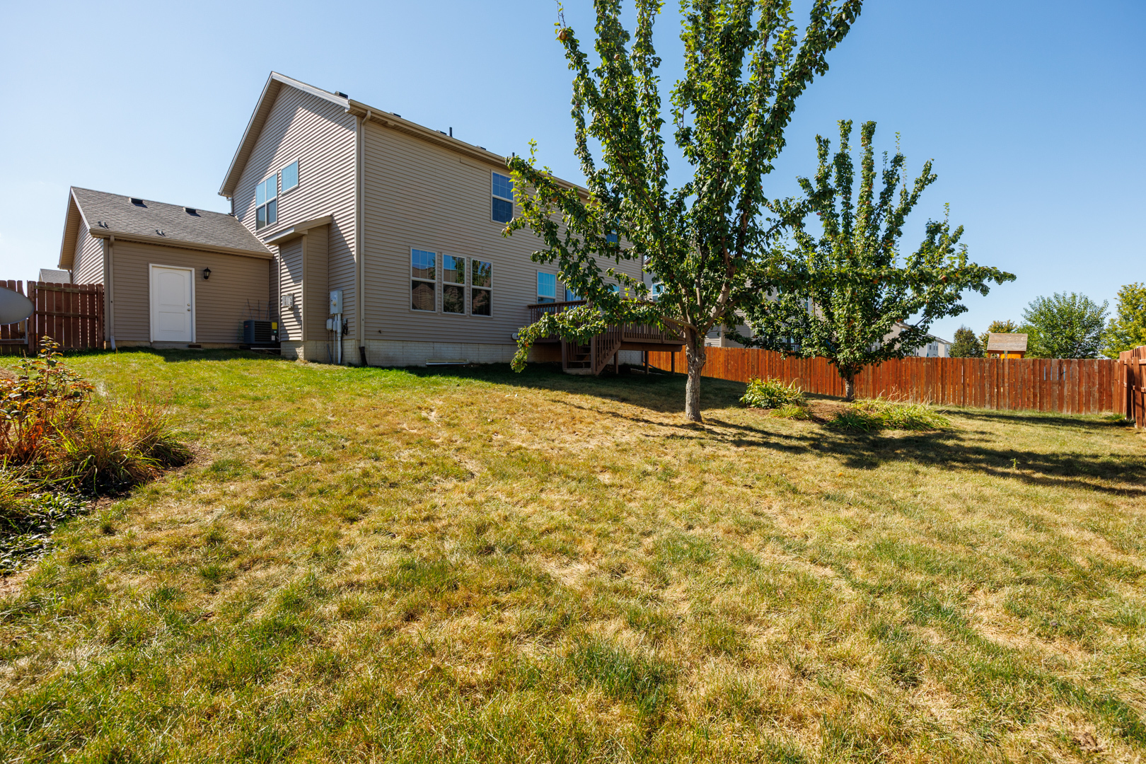 1714 Flagstone Drive Normal, IL 61761 - Photo 58 of 61 a backyard of a house