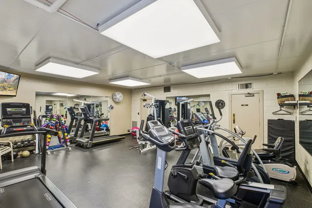 a view of a room with gym equipment