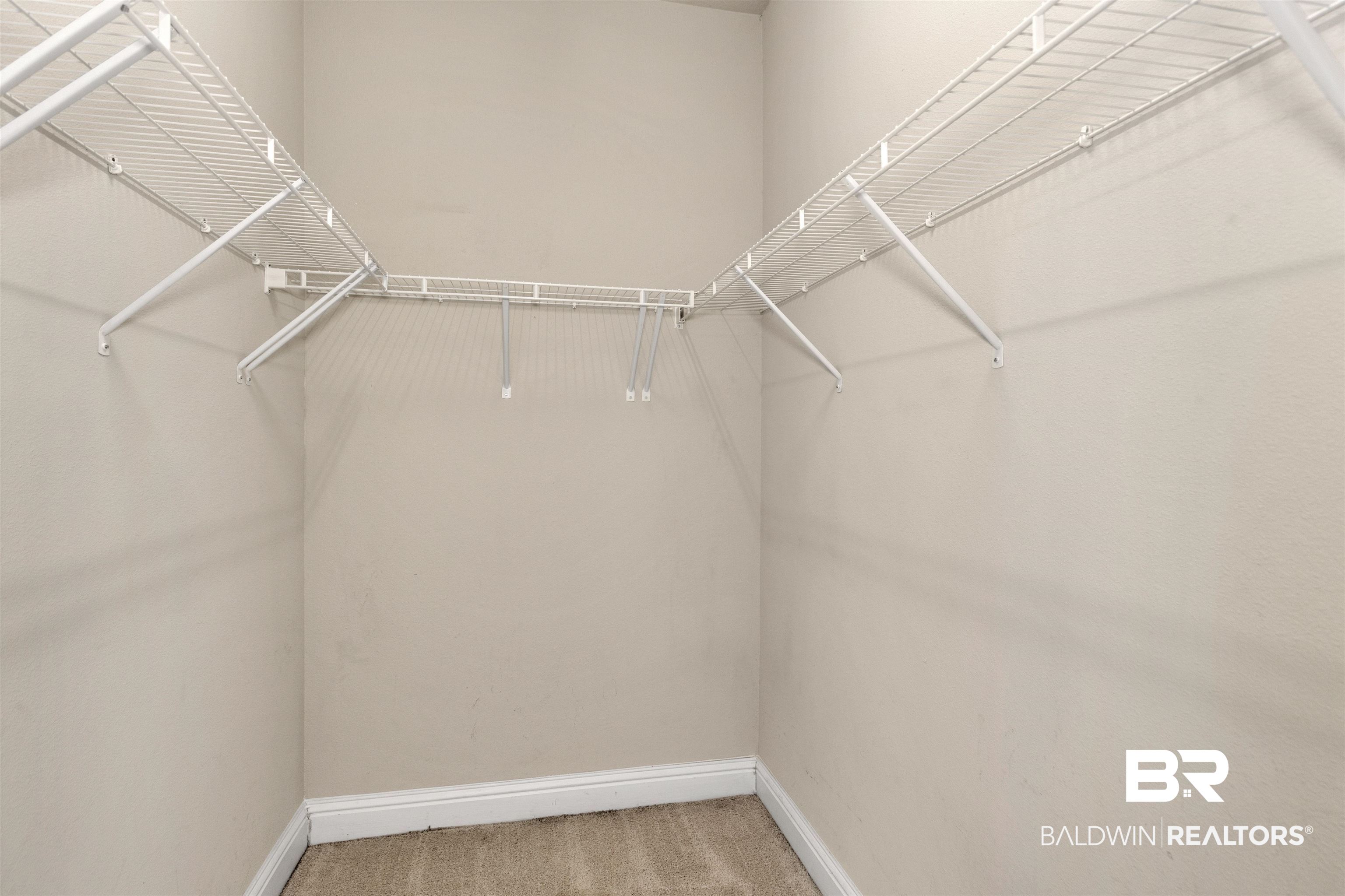 122 Open Field Drive Fairhope, AL 36532 - Photo 16 of 27 Spacious closet with carpet