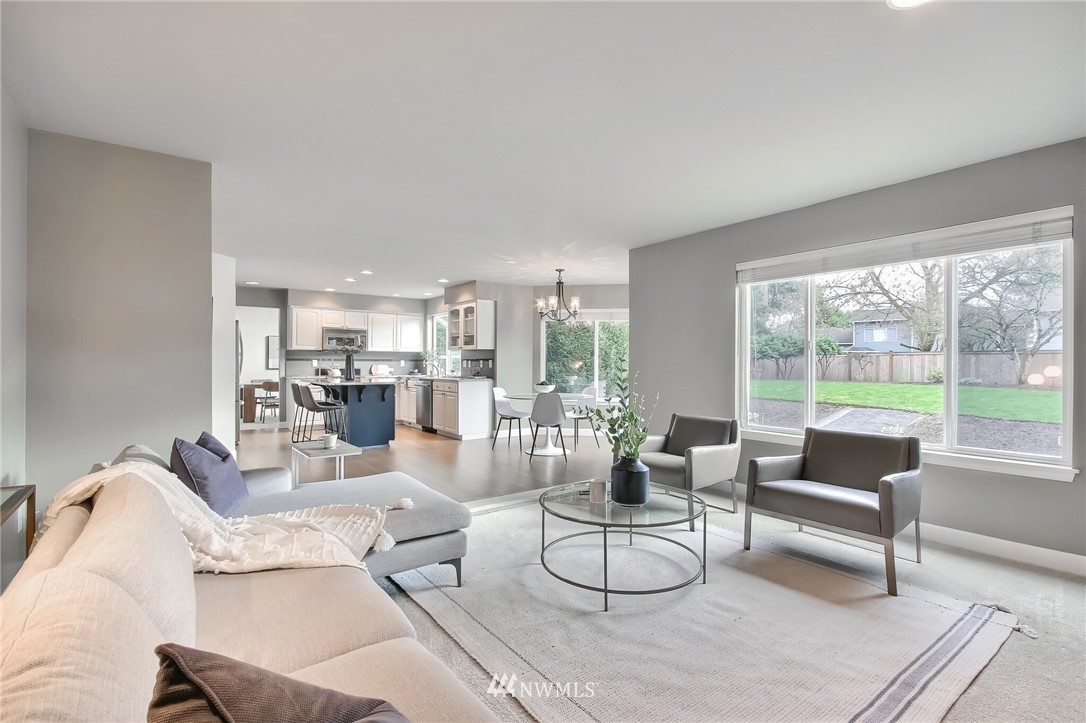 4405 Northeast 7th Street Renton, WA 98059 - Photo 15 of 27 a living room with furniture and a large window