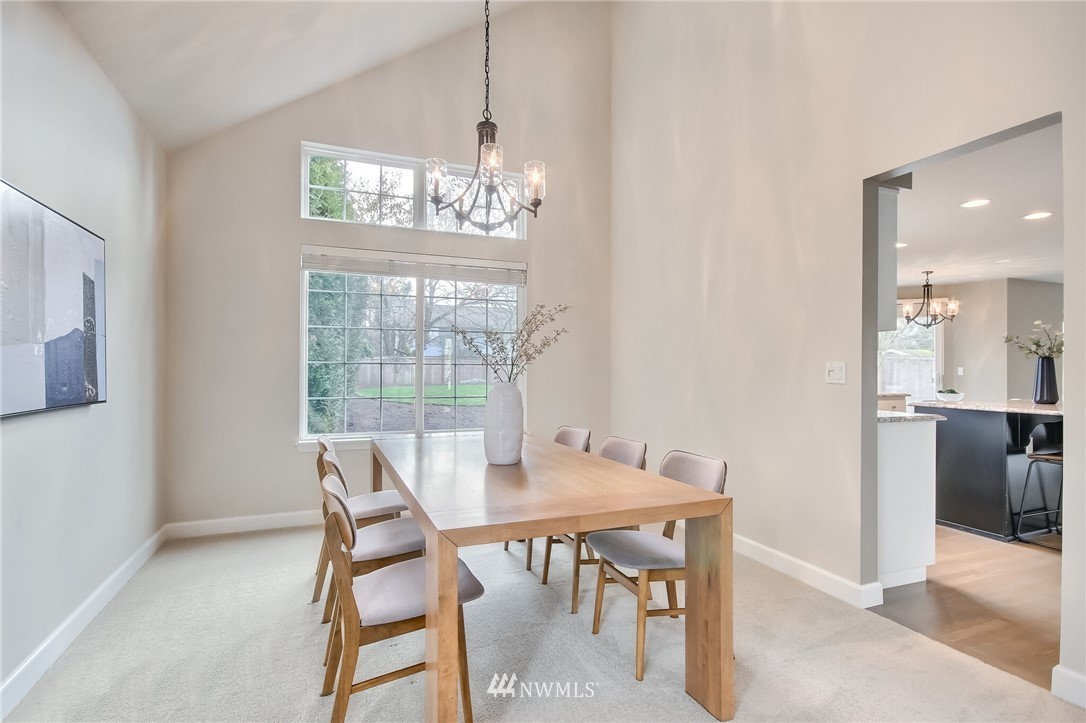 4405 Northeast 7th Street Renton, WA 98059 - Photo 7 of 27 a view of a dining room with furniture window and outside view