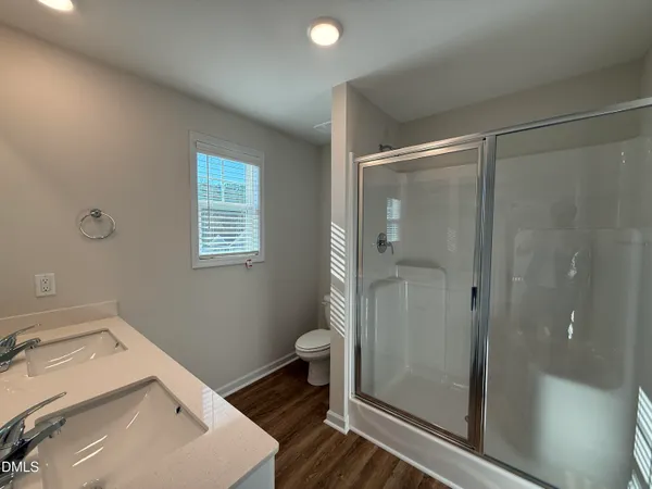 a bathroom with a sink and toilet