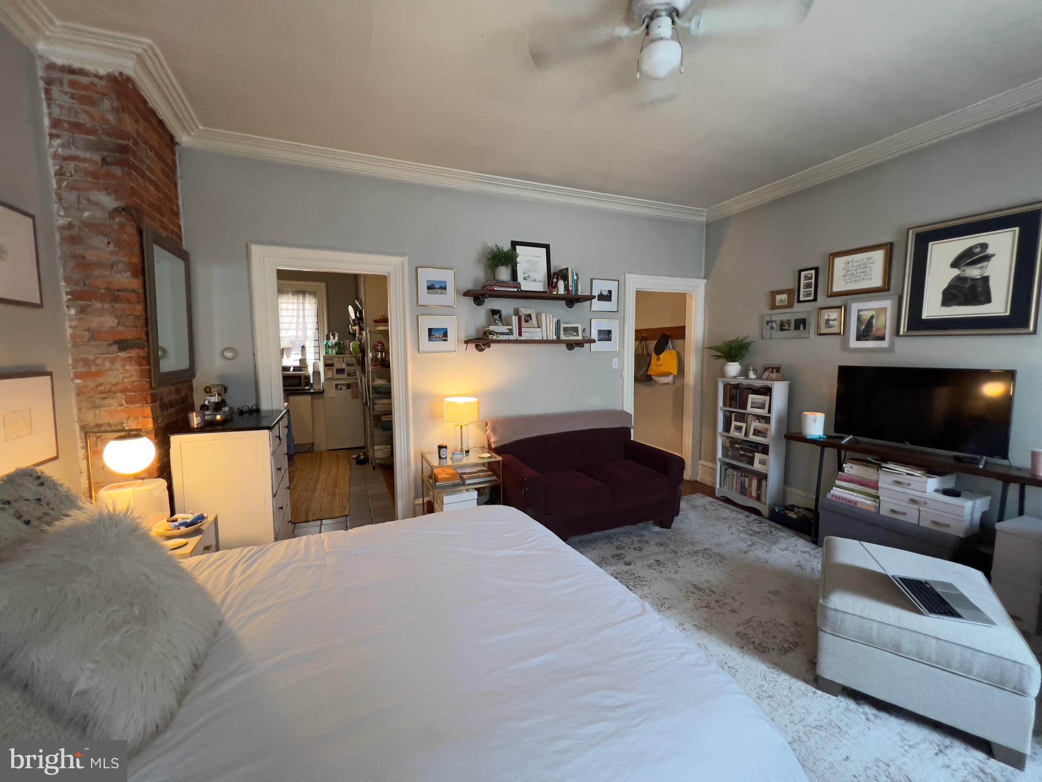 257 South 20th Street, Unit 2F Philadelphia, PA 19103 - Photo 21 of 29 a bedroom with a bed and furniture