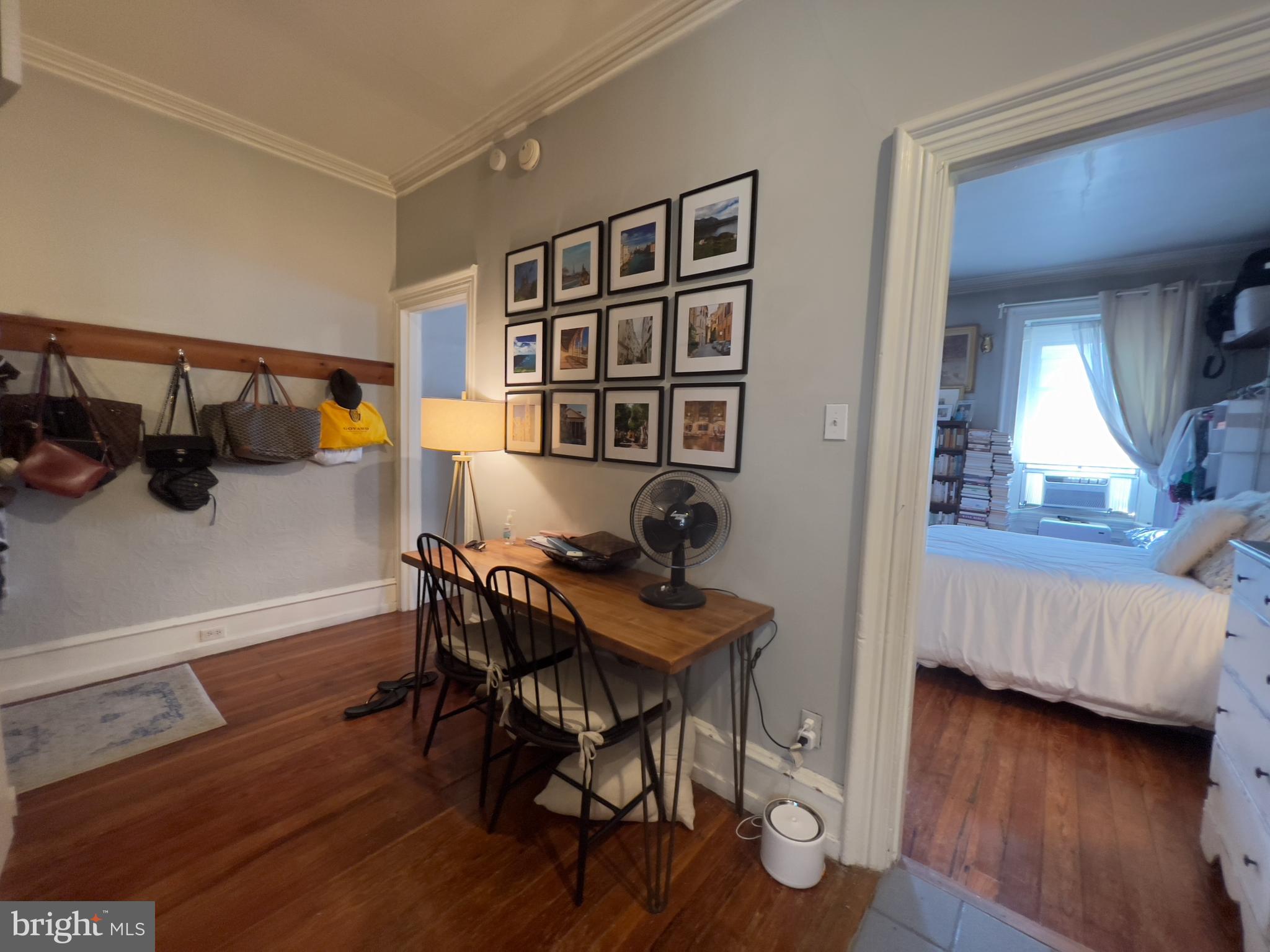257 South 20th Street, Unit 2F Philadelphia, PA 19103 - Photo 8 of 29 a workspace with furniture and wooden floor