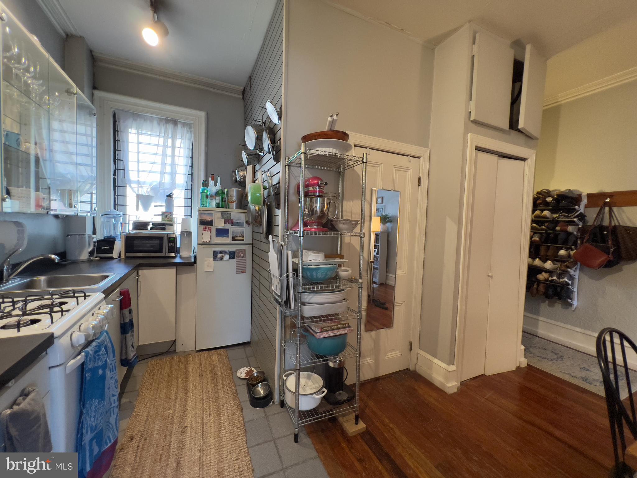 257 South 20th Street, Unit 2F Philadelphia, PA 19103 - Photo 9 of 29 a view of a kitchen with workspace and a window