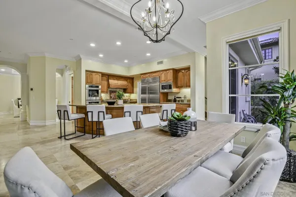 a living room filled with furniture and a table