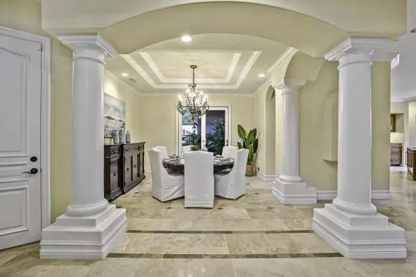 a view of a living room and dining room