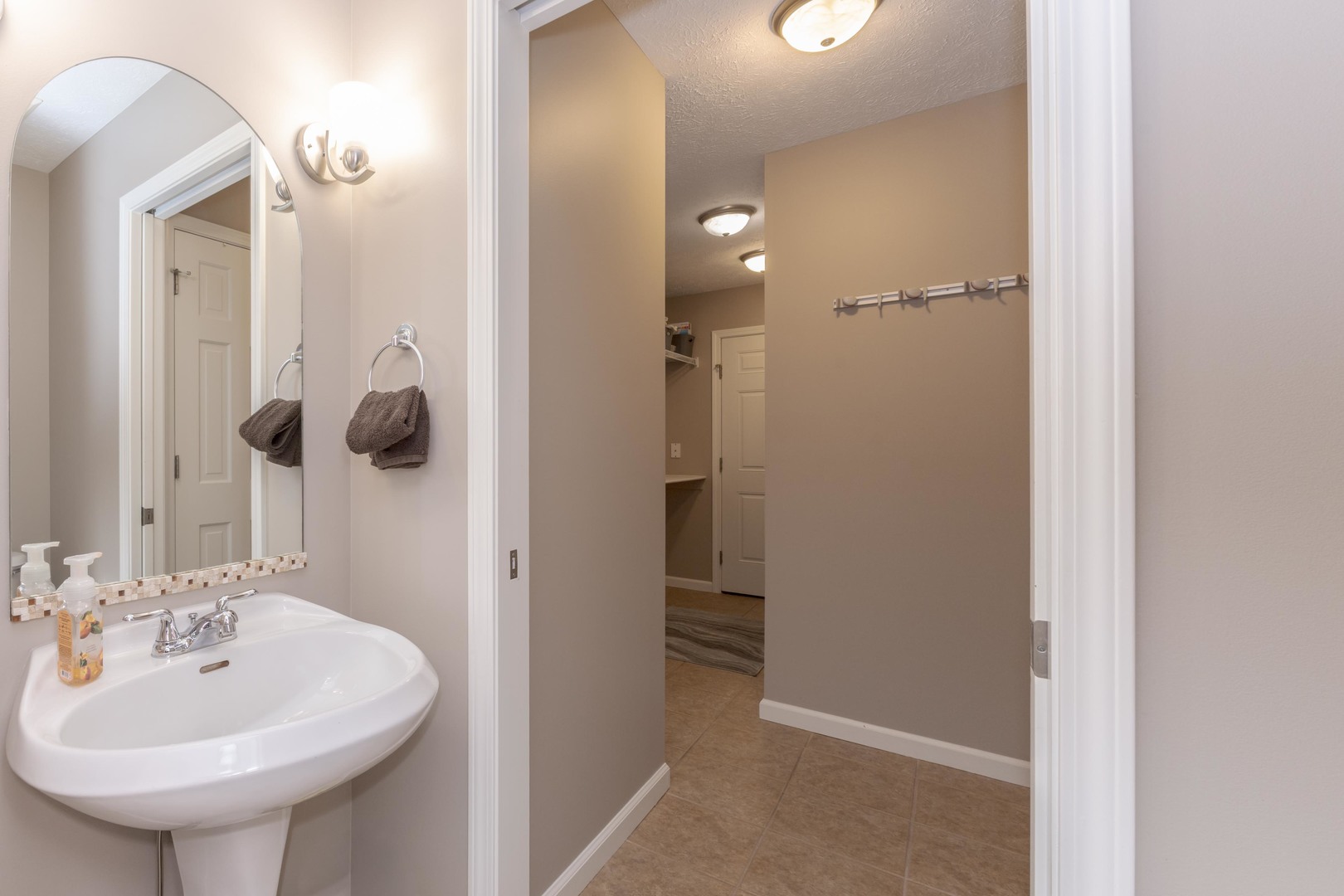 3276 Fire Fly Court Normal, IL 61761 - Photo 14 of 52 a bathroom with a sink and mirror