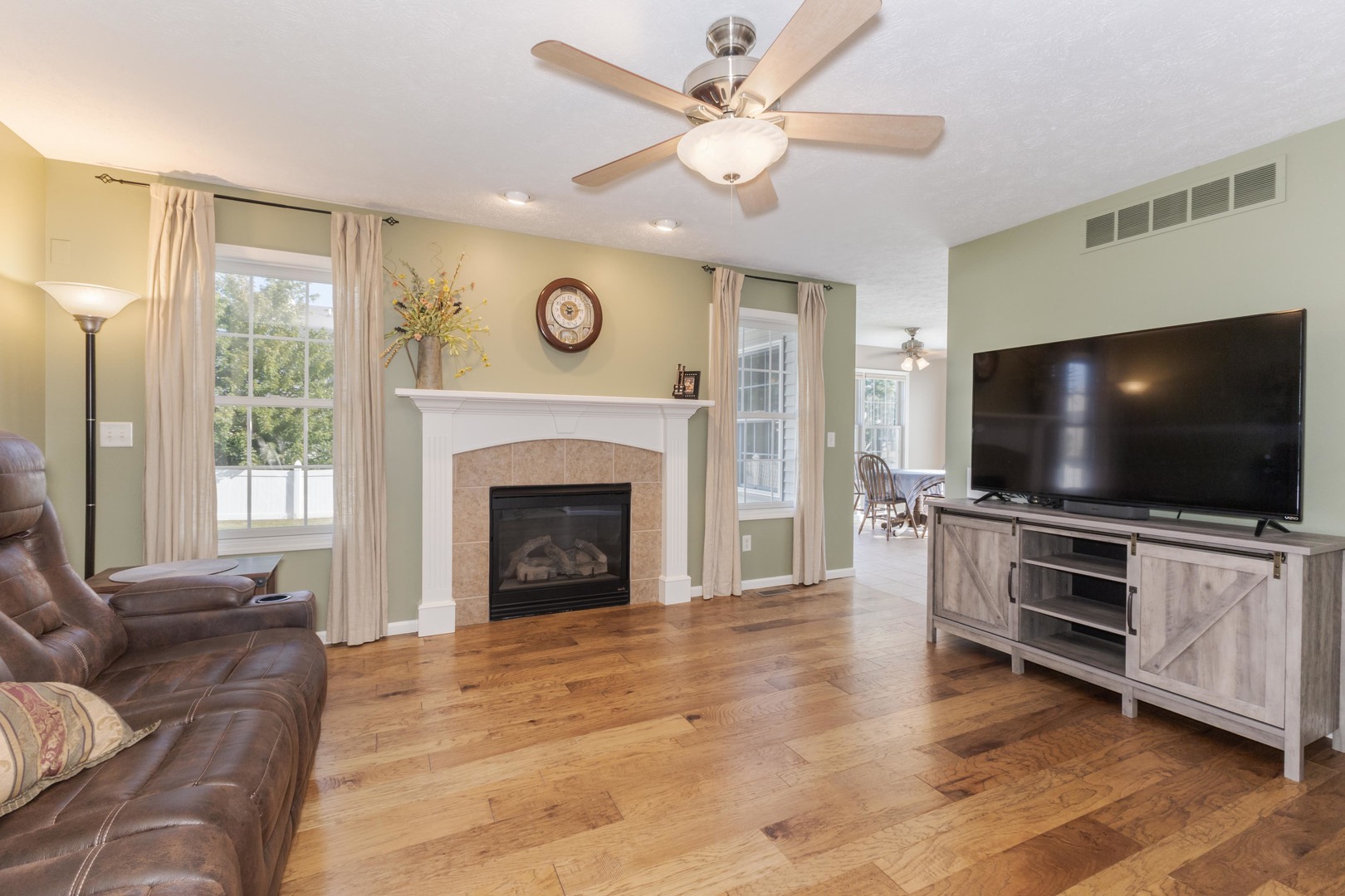 3276 Fire Fly Court Normal, IL 61761 - Photo 16 of 52 a living room with furniture and a flat screen tv