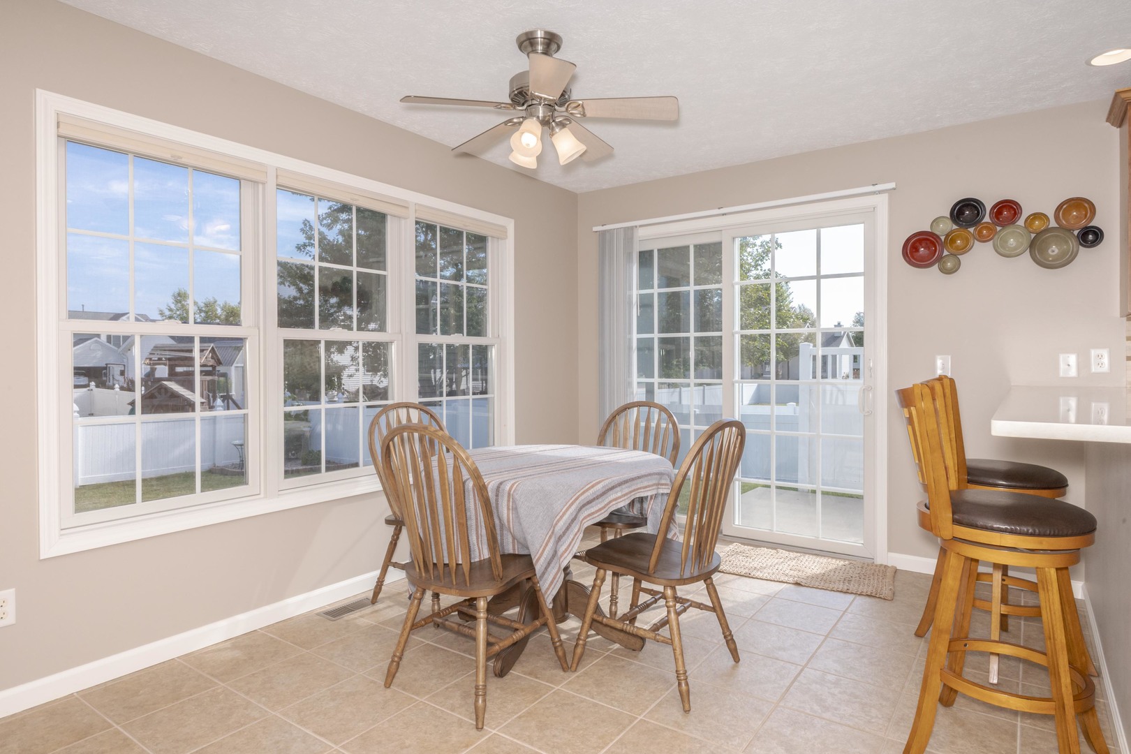 3276 Fire Fly Court Normal, IL 61761 - Photo 19 of 52 a view of a dining room with furniture window and outside view