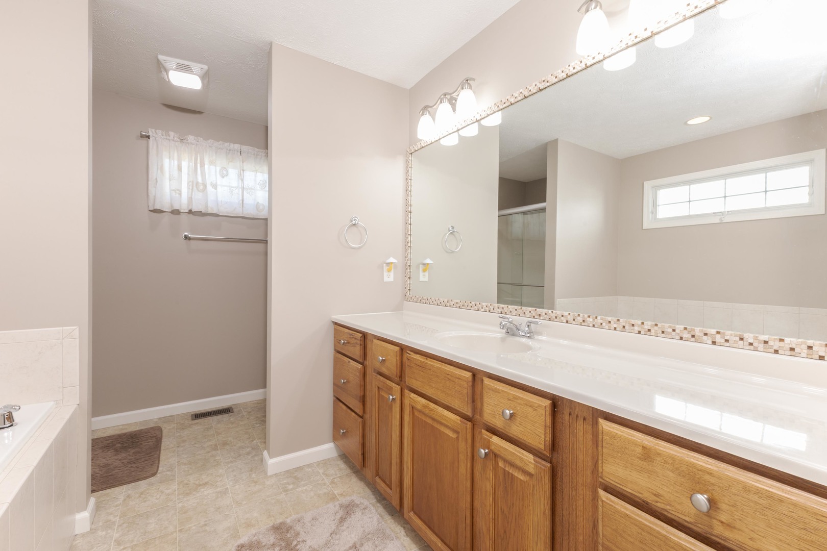 3276 Fire Fly Court Normal, IL 61761 - Photo 29 of 52 a bathroom with a sink double vanity and a mirror