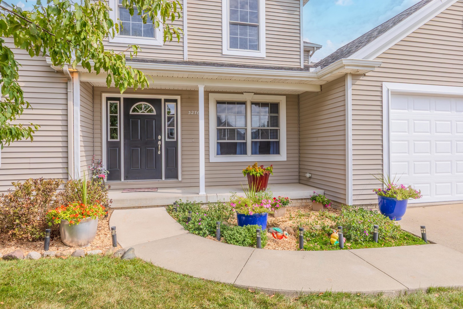 3276 Fire Fly Court Normal, IL 61761 - Photo 50 of 52 a front view of a house with garden