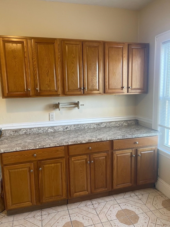 39 Magnolia Street, Unit 2 Malden, MA 02148 - Photo 5 of 15 a kitchen with a sink cabinets and a wooden floor