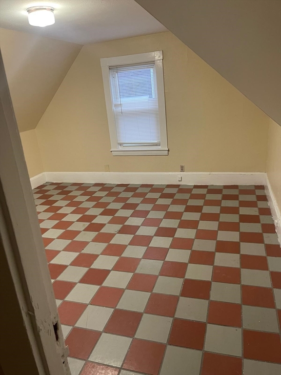 39 Magnolia Street, Unit 2 Malden, MA 02148 - Photo 10 of 15 a black and white checkered floor with a black white checkered floor