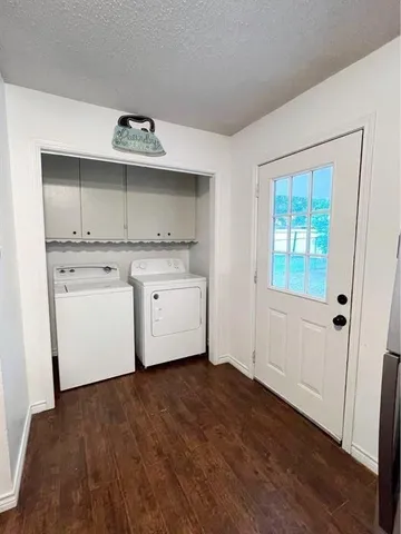 a utility room with washer and dryer
