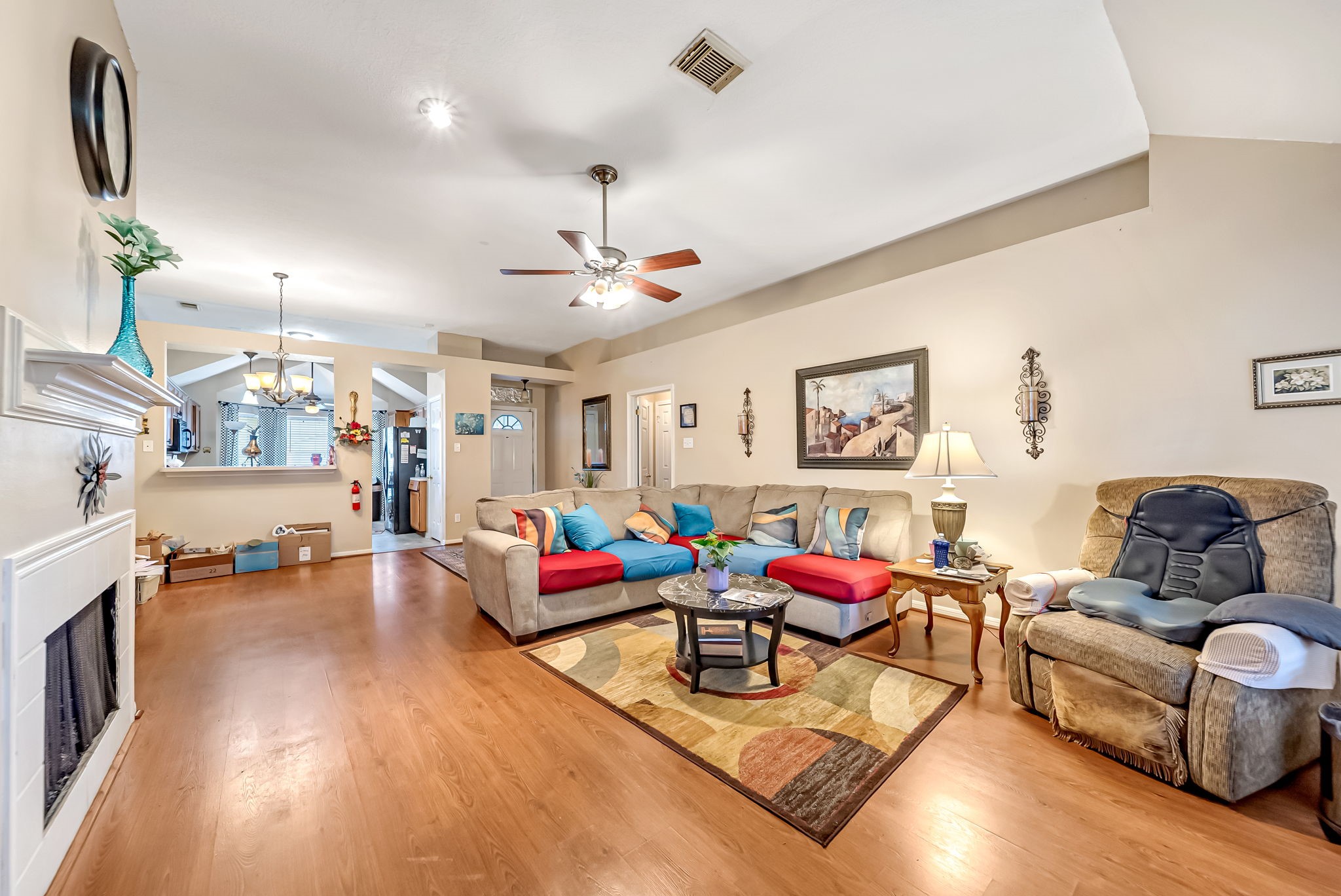 22906 Prairie Bird Lane Spring, TX 77373 - Photo 8 of 14 a living room with furniture and kitchen view
