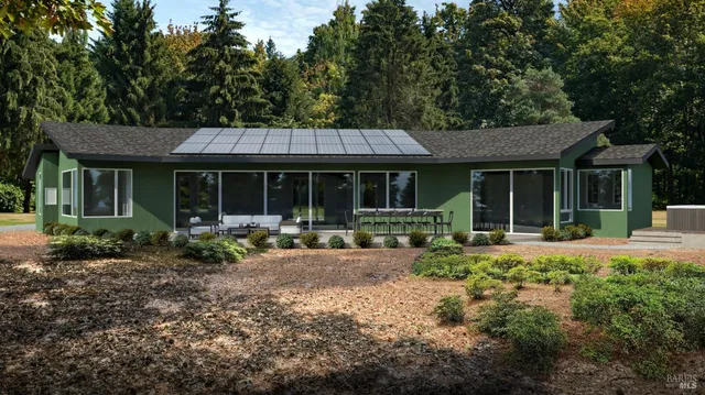 a front view of a house with garden and porch