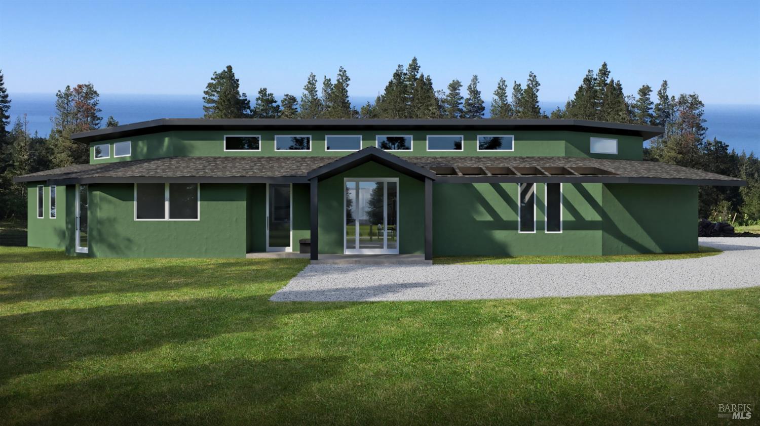 44035 Iversen Road Gualala, CA 95445 - Photo 3 of 18 a front view of a house with a garden