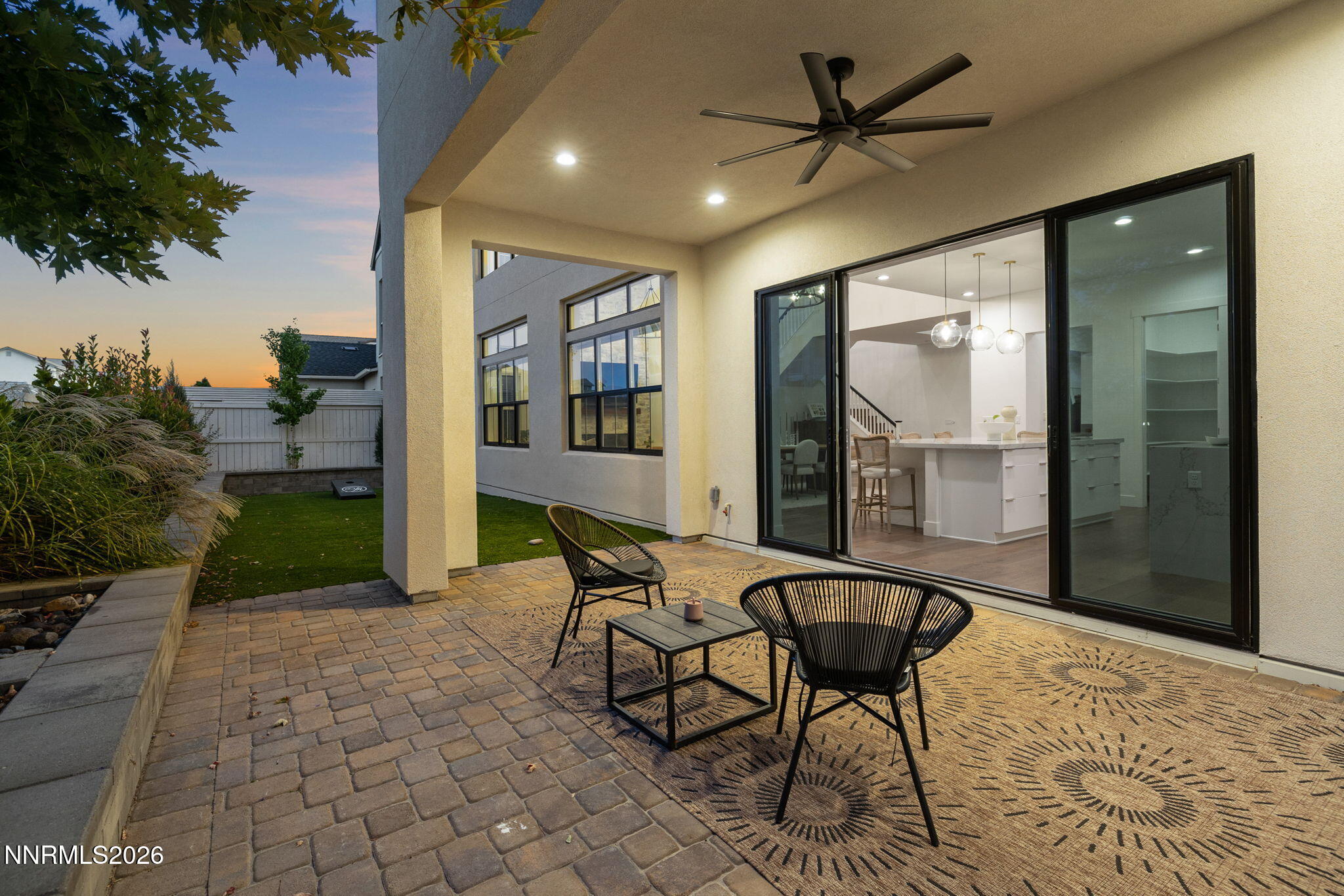 5406 Side Saddle Trail Reno, NV 89511 - Photo 34 of 39 a balcony with furniture and a potted plant