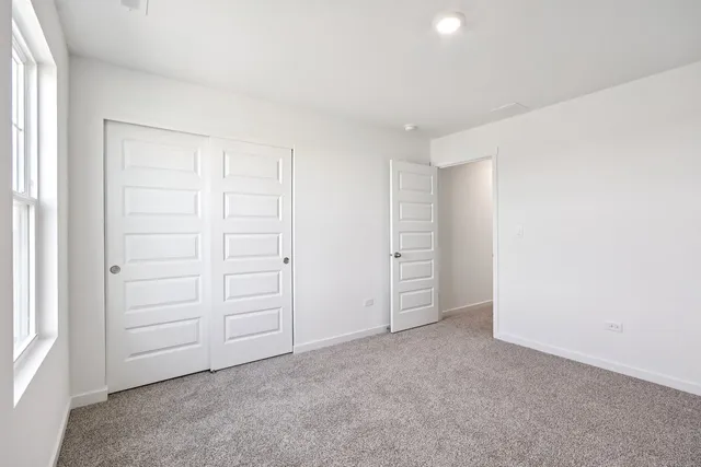 an empty room with closet