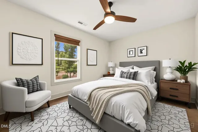 a bedroom with a bed and a couch