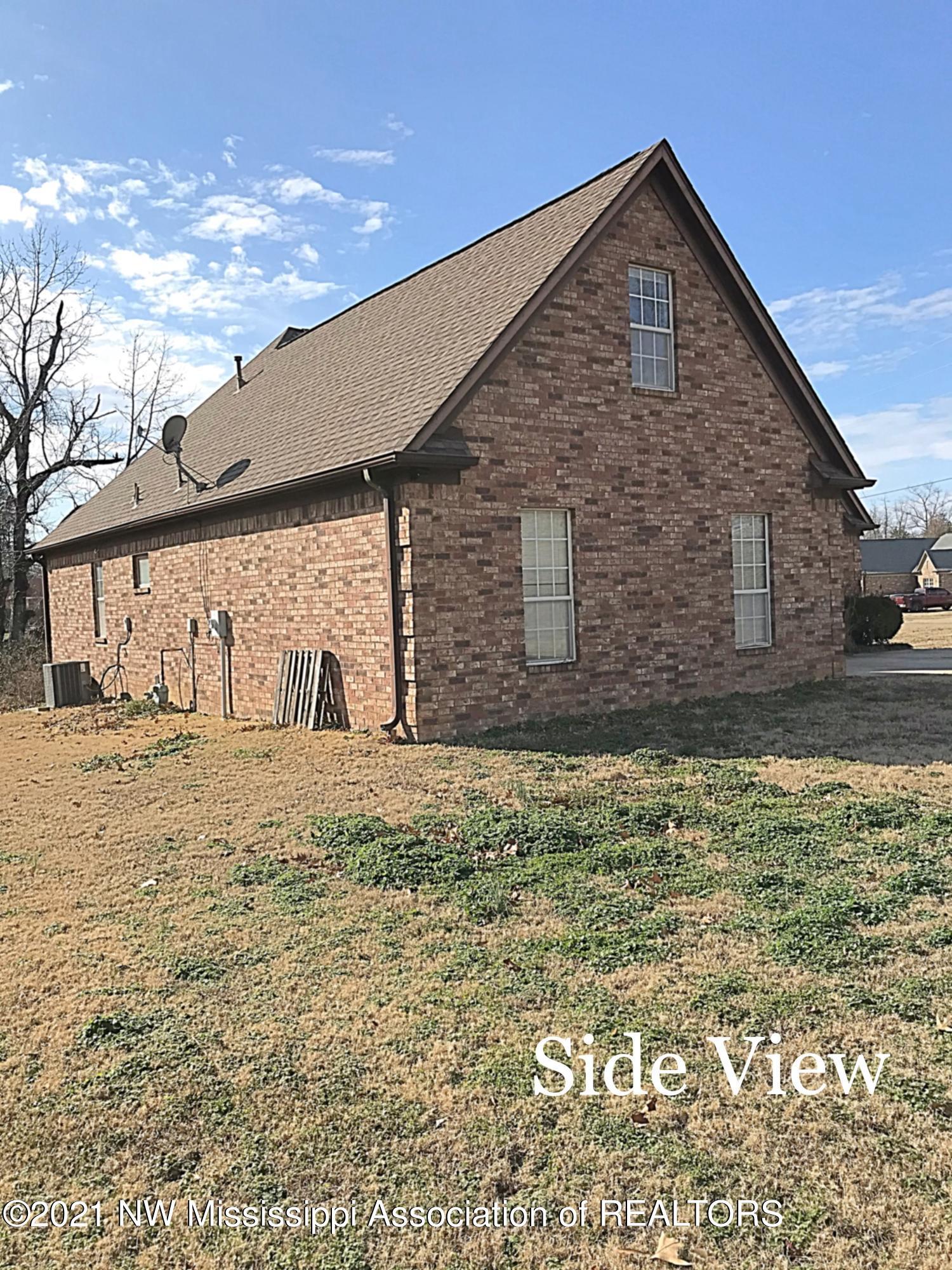 7397 Redbud Road Olive Branch, MS 38654 - Photo 3 of 28 3E8717C5-CA4D-4FE0-9803-4639B67EEF07