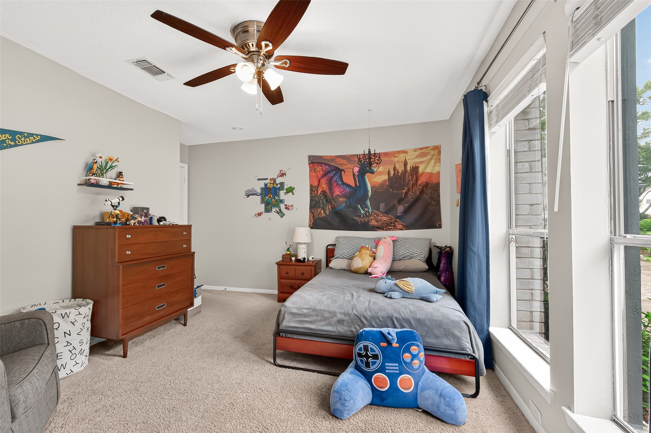 17611 Sorrell Ridge Drive Spring, TX 77388 - Photo 34 of 50 a bedroom with furniture and a large window