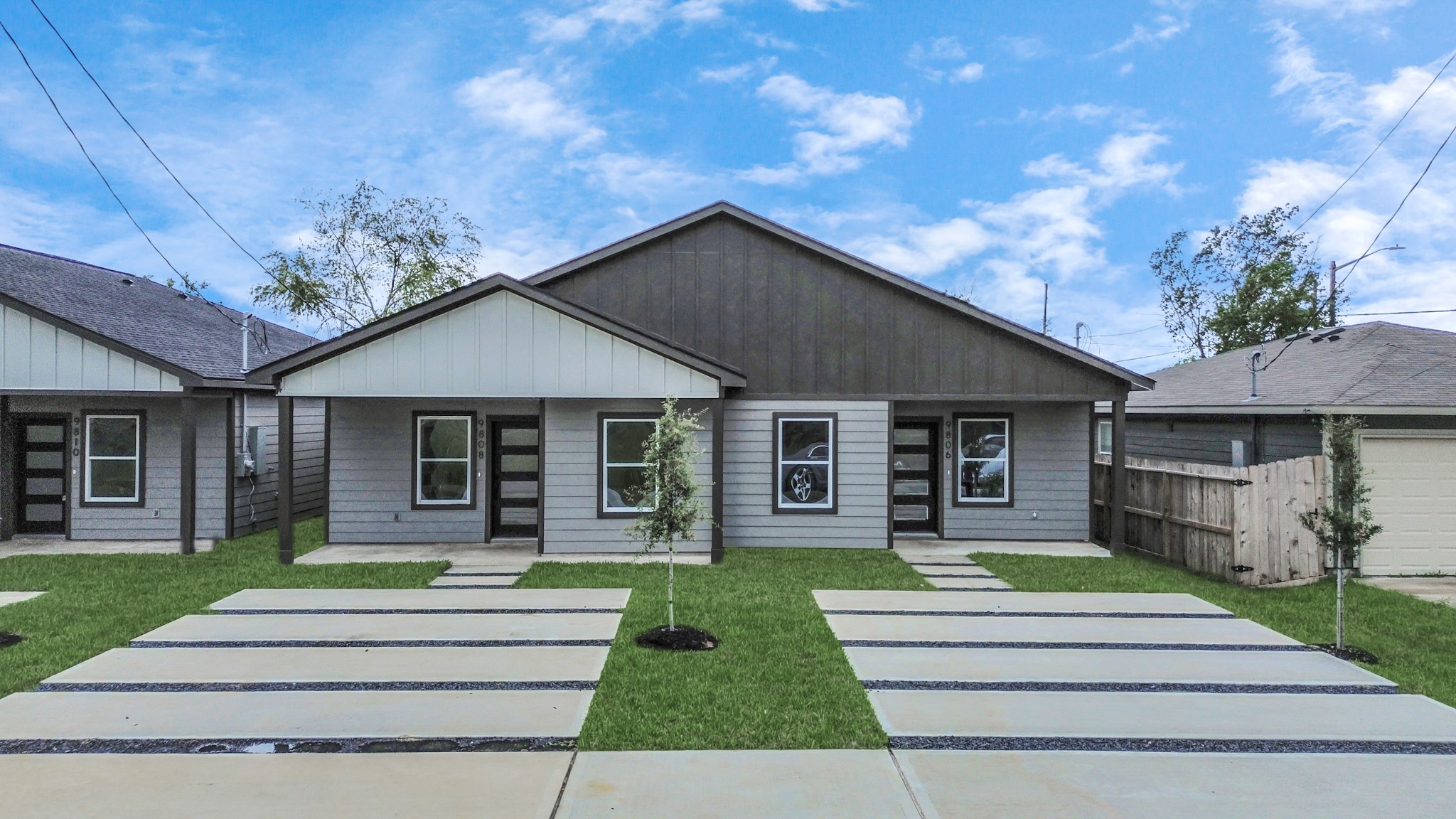 9808 Nedwald Street Houston, TX 77029 - Photo 2 of 39 a front view of a house with a garden and yard