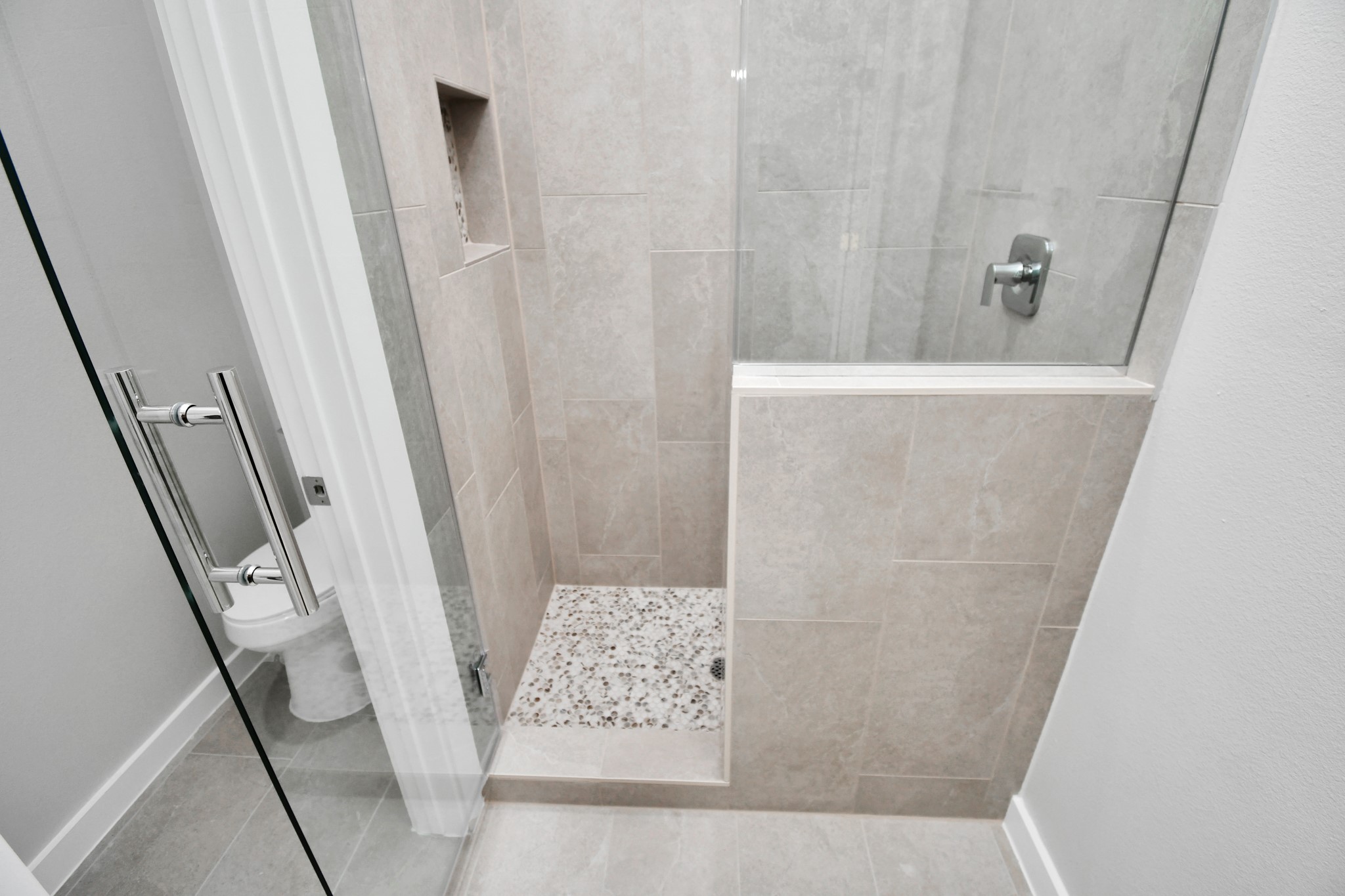 9808 Nedwald Street Houston, TX 77029 - Photo 36 of 39 a bathroom with a sink and a shower