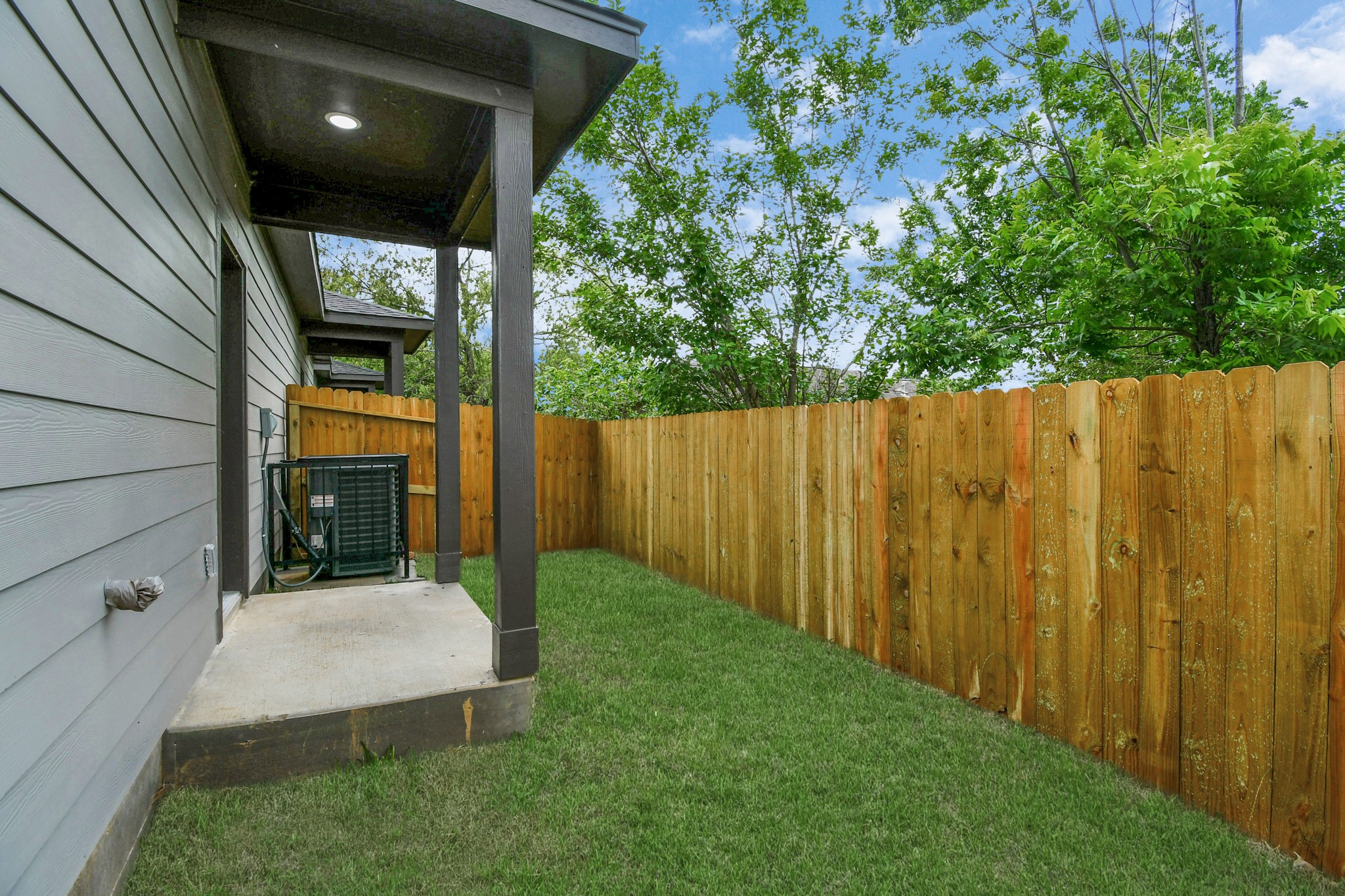 9808 Nedwald Street Houston, TX 77029 - Photo 37 of 39 a view of a door and an outdoor space