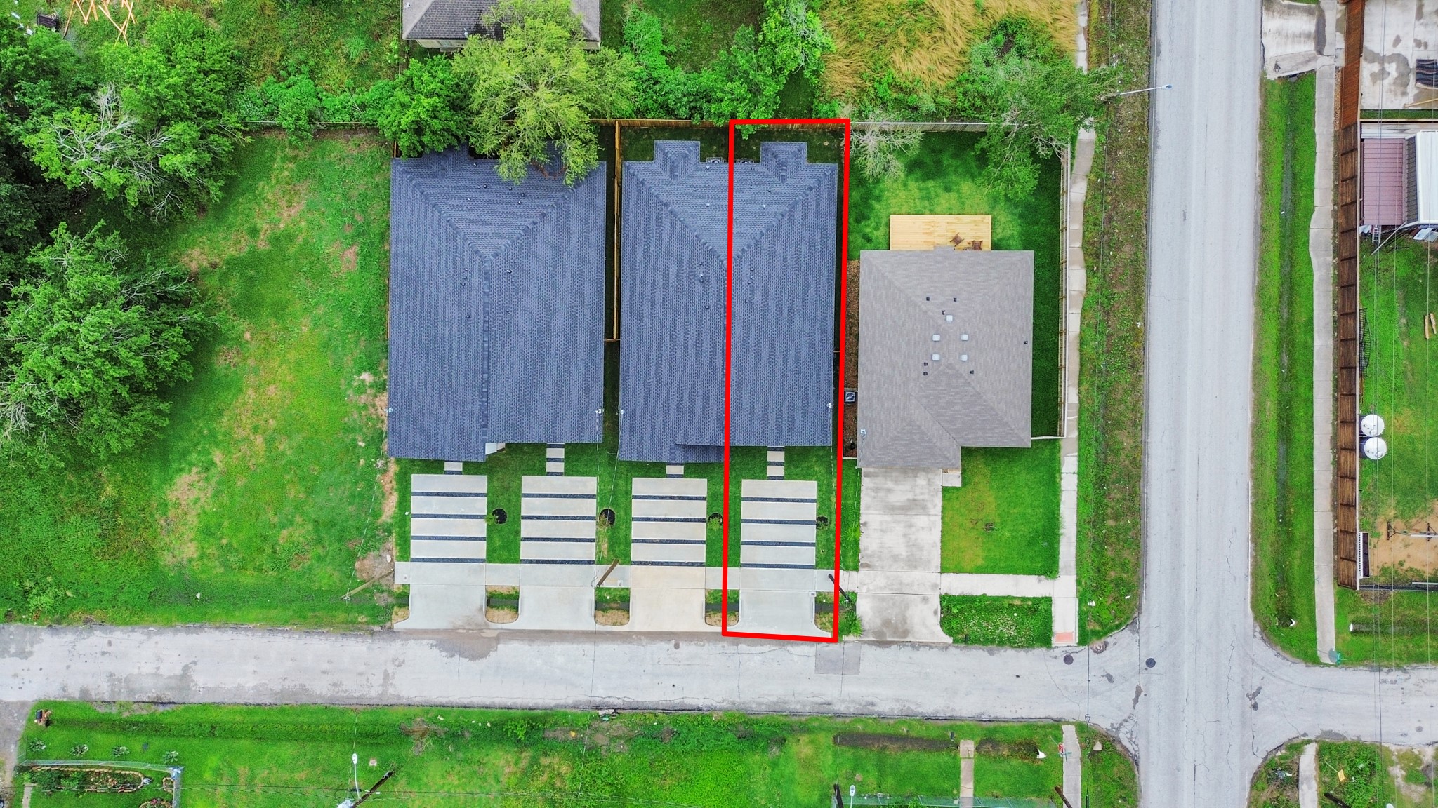 9808 Nedwald Street Houston, TX 77029 - Photo 4 of 39 a view of a house with a yard and plants