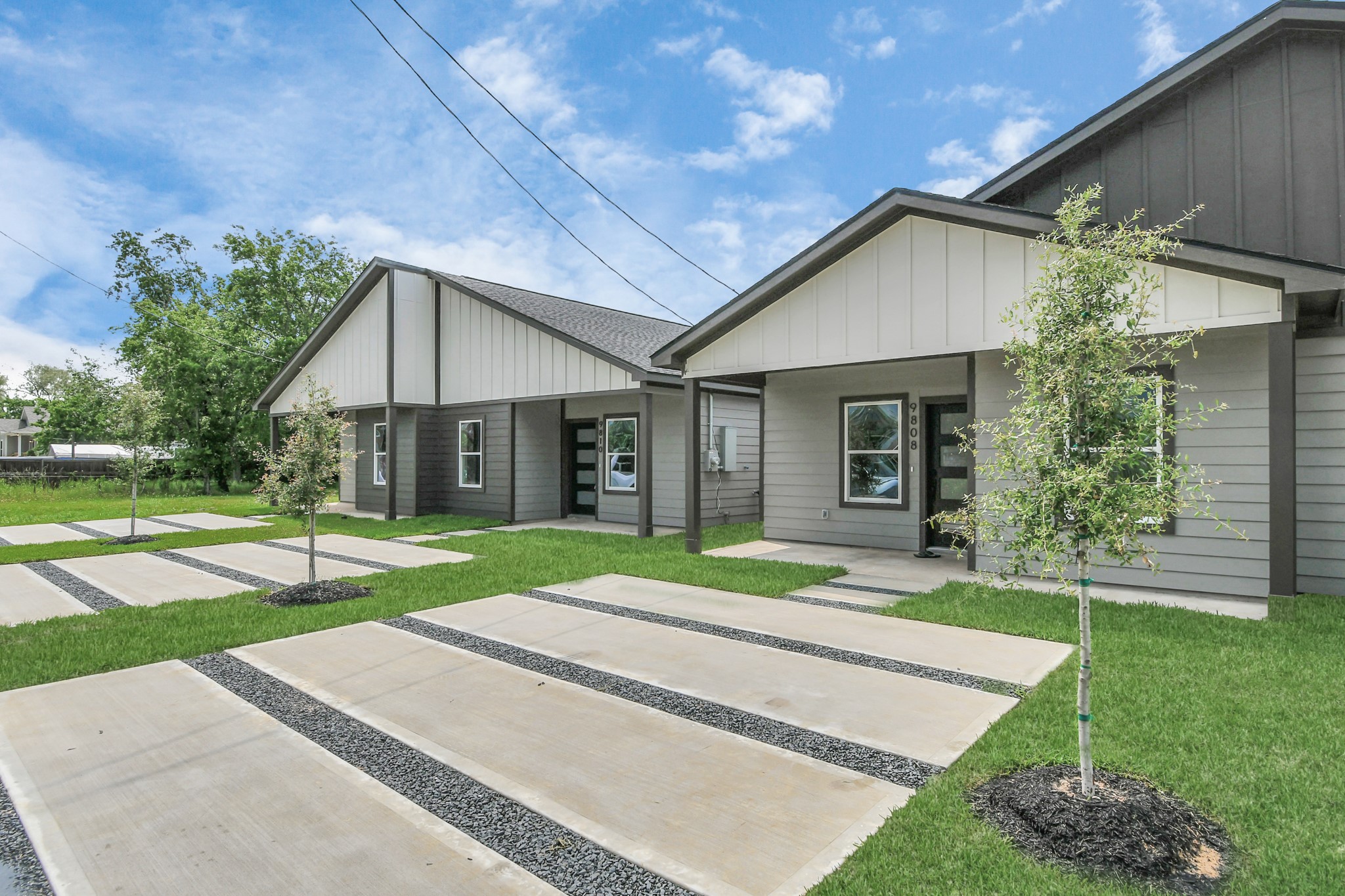 9808 Nedwald Street Houston, TX 77029 - Photo 8 of 39 a view of a house with a yard and tree s