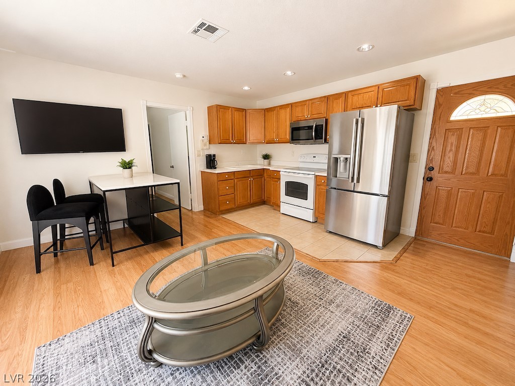 3010 East Viking Road Las Vegas, NV 89121 - Photo 33 of 48 An open-concept living area combines functionality and comfort in one bright space.