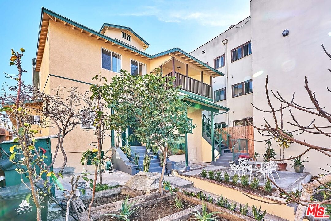 826 South Park View Street, Unit 1 Los Angeles, CA 90057 - Photo 9 of 14 a view of a building with a yard